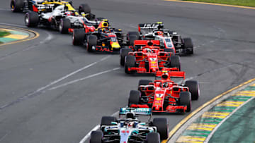 MELBOURNE, AUSTRALIA - MARCH 25: Lewis Hamilton of Great Britain driving the (44) Mercedes AMG Petronas F1 Team Mercedes WO9 leads Kimi Raikkonen of Finland driving the (7) Scuderia Ferrari SF71H , Sebastian Vettel of Germany driving the (5) Scuderia Ferrari SF71H (Photo by Mark Thompson/Getty Images)