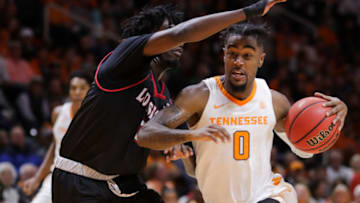KNOXVILLE, TN - NOVEMBER 9: Jordan Bone #0 of the Tennessee Volunteers drives the ball past Jeremy Hayes #3 of the Louisiana Lafayette Ragin Cajuns during the first half of the game between the Louisiana-Lafayette Ragin' Cajuns and the Tennessee Volunteers at Thompson-Boling Arena on November 9, 2018 in Knoxville, Tennessee. (Photo by Donald Page/Getty Images)