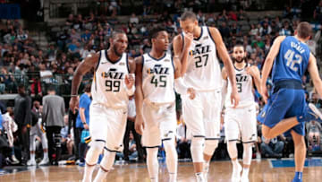 DALLAS, TX - MARCH 22: Jae Crowder #99 Donovan Mitchell #45 and Rudy Gobert #27 of the Utah Jazz look on during the game against the Dallas Mavericks on March 22, 2018 at the American Airlines Center in Dallas, Texas. Copyright 2018 NBAE (Photo by Glenn James/NBAE via Getty Images)