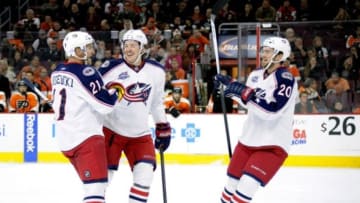 Nov 14, 2014; Philadelphia, PA, USA; Columbus Blue Jackets defenseman James Wisniewski (21) celebrates his goal with center Ryan Johansen (19) and defenseman Tim Erixon (20) against the Philadelphia Flyers during the first period at Wells Fargo Center. Mandatory Credit: Eric Hartline-USA TODAY Sports