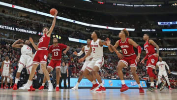 CHICAGO, ILLINOIS - MARCH 14: Evan Fitzner #55 of the Indiana Hoosiers rebounds over Andre Wesson #24 of the Ohio State Buckeyes at the United Center on March 14, 2019 in Chicago, Illinois. Ohio State defeated Indiana 79-75. (Photo by Jonathan Daniel/Getty Images)