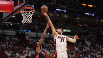 Miami Heat guard Max Strus (31) puts up a shot over Philadelphia 76ers guard James Harden (1)(Jasen Vinlove-USA TODAY Sports)