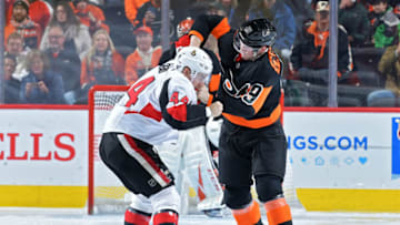 PHILADELPHIA, PA - DECEMBER 07: Jean-Gabriel Pageau #44 of the Ottawa Senators and Joel Farabee #49 of the Philadelphia Flyers fight in the second period at Wells Fargo Center on December 7, 2019 in Philadelphia, Pennsylvania. (Photo by Drew Hallowell/Getty Images)