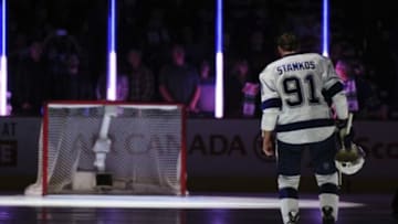 Oct 18, 2014; Vancouver, British Columbia, CAN; Tampa Bay Lightning forward Steven Stamkos (91) stands during the national anthem before the start of the first period against the Vancouver Canucks at Rogers Arena. The Tampa Bay Lightning won 4-2. Mandatory Credit: Anne-Marie Sorvin-USA TODAY Sports