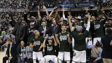 Mar 13, 2016; Indianapolis, IN, USA; Michigan State Spartans celebrate winning the Big Ten Championship against the Purdue Boilermakers during the Big Ten conference tournament at Bankers Life Fieldhouse. Michigan State defeats Purdue 66-62. Mandatory Credit: Brian Spurlock-USA TODAY Sports