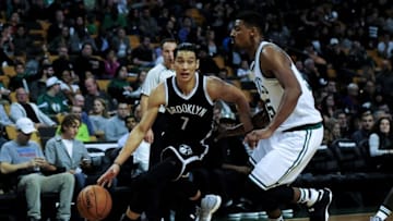 Oct 17, 2016; Boston, MA, USA; Brooklyn Nets guard Jeremy Lin (7) drives to the basket past Boston Celtics forward Jordan Mickey (55) during the second half at TD Garden. Mandatory Credit: Bob DeChiara-USA TODAY Sports