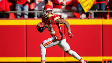 Dec 12, 2021; Kansas City, Missouri, USA; Kansas City Chiefs cornerback Mike Hughes (21) returns a fumble for a touchdown against the Las Vegas Raiders during the first half at GEHA Field at Arrowhead Stadium. Mandatory Credit: Jay Biggerstaff-USA TODAY Sports