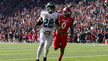 Tyjae Spears of the Tulane Green Wave scores a touchdown past the Cincinnati Bearcats at Nippert Stadium. Getty Images.