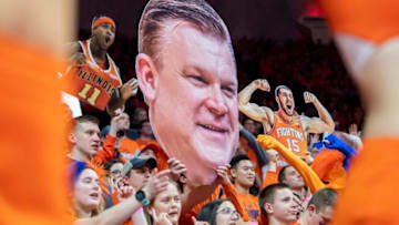 Jan 30, 2020; Champaign, Illinois, USA; The Illinois Fighting Illini Orange Krush student section distracts the Minnesota Golden Gophers during a free throw during the second half at State Farm Center. Mandatory Credit: Patrick Gorski-USA TODAY Sports
