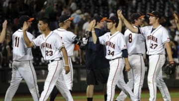 Jun 23, 2015; Omaha, NE, USA; Virginia Cavaliers players celebrate after the victory against the Vanderbilt Commodores in game two of the College World Series Finals at TD Ameritrade Park. Mandatory Credit: Steven Branscombe-USA TODAY Sports