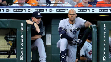 Jul 21, 2022; Houston, Texas, USA; New York Yankees manager Aaron Boone (17, left) and left fielder Aaron Hicks (31) watch the action from the dugout against the Houston Astros during the first inning at Minute Maid Park. Mandatory Credit: Erik Williams-USA TODAY Sports