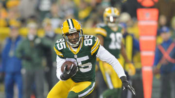 GREEN BAY, WI - JANUARY 05: Greg Jennings #85 of the Green Bay Packers carries the ball during an NFL game against the Minnesota Vikings at Lambeau Field, January 5, 2013 in Green Bay, Wisconsin. (Photo by Tom Dahlin/Getty Images)
