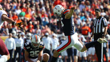 Jan 1, 2020; Tampa, Florida, USA; Auburn football place kicker Anders Carlson (26) makes a field goal against the Minnesota Golden Gophers during the first quarter at Raymond James Stadium. Mandatory Credit: Kim Klement-USA TODAY Sports