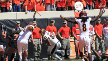 Sep 10, 2016; Stillwater, OK, USA; Central Michigan Chippewas tight end Tyler Conklin (83) runs in for a touchdown against Oklahoma State Cowboys as Central Michigan Chippewas wide receiver Corey Willis (8) celebrates during the second quarter at Boone Pickens Stadium. Mandatory Credit: Alonzo Adams-USA TODAY Sports