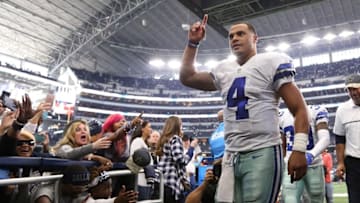Nov 20, 2016; Arlington, TX, USA; Dallas Cowboys quarterback Dak Prescott (4) celebrates as he heads to the locker room after the game against the Baltimore Ravens at AT&T Stadium. The Cowboys beat the Raven 27-17. Mandatory Credit: Matthew Emmons-USA TODAY Sports