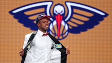 Jun 23, 2016; New York, NY, USA; Buddy Hield (Oklahoma) shows off the inside of his jacket after being selected as the number six overall pick to the New Orleans Pelicans in the first round of the 2016 NBA Draft at Barclays Center. Mandatory Credit: Brad Penner-USA TODAY Sports