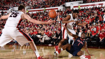 Feb 27, 2016; Athens, GA, USA; Mississippi Rebels guard Martavious Newby (1) loses the rebound to the defense of Georgia Bulldogs forward Yante Maten (1) and forward Kenny Paul Geno (25) during the first half at Stegeman Coliseum. Mandatory Credit: Dale Zanine-USA TODAY Sports