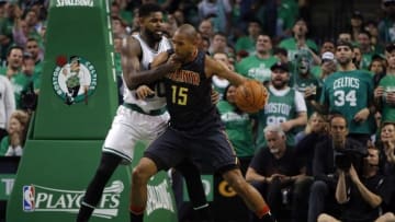 Apr 22, 2016; Boston, MA, USA; Atlanta Hawks center Al Horford (15) works the ball against Boston Celtics forward Amir Johnson (90) during the second quarter in game three of the first round of the NBA Playoffs at TD Garden. Mandatory Credit: David Butler II-USA TODAY Sports
