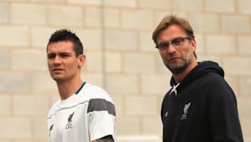 LIVERPOOL, ENGLAND - MAY 04: Dejan Lovren (L) and Jurgen Klopp, manager of Liverpool arrive for a press conference ahead of the UEFA Europa League Semi-Final Second Leg match against Villarreal at Melwood Training Ground on May 4, 2016 in Liverpool, England. (Photo by Clint Hughes/Getty Images)