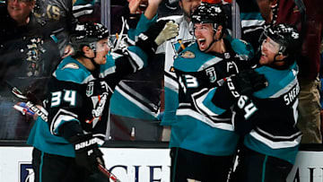 ANAHEIM, CA - OCTOBER 21: Sam Steel #34, Max Comtois #53, and Kiefer Sherwood #64 of the Anaheim Ducks celebrate Sherwood's second period goal during the game against the Buffalo Sabres on October 21, 2018 at Honda Center in Anaheim, California. (Photo by Debora Robinson/NHLI via Getty Images)