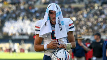 BOULDER, CO - OCTOBER 16: Quarterback Gunner Cruz #9 of the Arizona Wildcats walks off the field after being removed from the game against the Colorado Buffaloes in the third quarter at Folsom Field on October 16, 2021 in Boulder, Colorado. (Photo by Dustin Bradford/Getty Images)