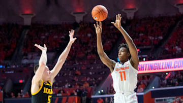Mar 8, 2020; Champaign, Illinois, USA; Illinois Fighting Illini guard Ayo Dosunmu (11) hits a three-point shot during the first half against the Iowa Hawkeyes at State Farm Center. Mandatory Credit: Patrick Gorski-USA TODAY Sports