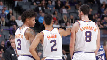 SACRAMENTO, CA - NOVEMBER 19: Kelly Oubre Jr. #3, Elie Okobo #2 and Frank Kaminsky #8 of the Phoenix Suns talk during the game against the Sacramento Kings on November 19, 2019 at Golden 1 Center in Sacramento, California. NOTE TO USER: User expressly acknowledges and agrees that, by downloading and or using this photograph, User is consenting to the terms and conditions of the Getty Images Agreement. Mandatory Copyright Notice: Copyright 2019 NBAE (Photo by Rocky Widner/NBAE via Getty Images)