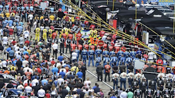 Jul 19, 2015; Loudon, NH, USA; Crews line up for the national anthem before the 5-Hour Energy 301 at New Hampshire Motor Speedway. Mandatory Credit: Jasen Vinlove-USA TODAY Sports
