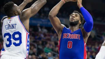 Dec 11, 2015; Philadelphia, PA, USA; Detroit Pistons center Andre Drummond (0) shoots as Philadelphia 76ers forward Jerami Grant (39) defendes during the second quarter at Wells Fargo Center. Mandatory Credit: Bill Streicher-USA TODAY Sports
