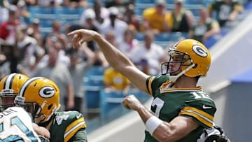 Sep 11, 2016; Jacksonville, FL, USA; Green Bay Packers quarterback Aaron Rodgers (12) throws a touchdown pass to wide receiver Davante Adams (not pictured) against the Jacksonville Jaguars in the second quarter at Everbank Field. Mandatory Credit: Rick Wood/Milwaukee Journal Sentinel via USA TODAY NETWORK