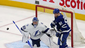 May 2, 2022; Toronto, Ontario, CAN; Tampa Bay Lightning goaltender Andrei Vasilevskiy (88) defends the goal against Toronto Maple Leafs forward John Tavares (91) during the second period of game one of the first round of the 2022 Stanley Cup Playoffs at Scotiabank Arena. Mandatory Credit: John E. Sokolowski-USA TODAY Sports