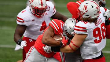COLUMBUS, OH - OCTOBER 24: Master Teague III #33 of the Ohio State Buckeyes plows in to Casey Rogers #98 of the Nebraska Cornhuskers to pick up yardage in the first quarter at Ohio Stadium on October 24, 2020 in Columbus, Ohio. (Photo by Jamie Sabau/Getty Images)