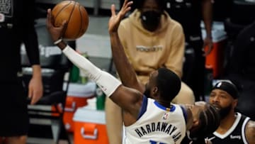 May 22, 2021; Los Angeles, California, USA; Dallas Mavericks forward Tim Hardaway Jr. (11) puts up a shot back LA Clippers forward Kawhi Leonard (2) during game one in the first round of the 2021 NBA Playoffs at Staples Center. Mandatory Credit: Robert Hanashiro-USA TODAY Sports