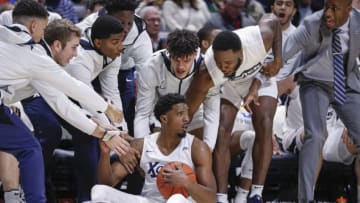 CINCINNATI, OH - NOVEMBER 15: Quentin Goodin #3 of the Xavier Musketeers looks back out on the court after colliding into the bench during the second half against the Missouri State Bears at Cintas Center on November 15, 2019 in Cincinnati, Ohio. (Photo by Michael Hickey/Getty Images)