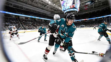 SAN JOSE, CA - DECEMBER 23: Timo Meier #28 of the San Jose Sharks battles for the puck against Ilya Lyubushkin #46 of the Arizona Coyotes at SAP Center on December 23 2018 in San Jose, California (Photo by Brandon Magnus/NHLI via Getty Images)