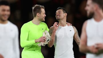 BOURNEMOUTH, ENGLAND - DECEMBER 17: Simon Mignolet of Liverpool and Dejan Lovren of Liverpool are all smiles after the Premier League match between AFC Bournemouth and Liverpool at Vitality Stadium on December 17, 2017 in Bournemouth, England. (Photo by Catherine Ivill/Getty Images)