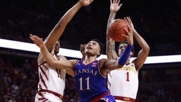 AMES, IA - JANUARY 5: Devon Dotson #11 of the Kansas Jayhawks takes a shot as Talen Horton-Tucker #11 of the Iowa State Cyclones, and Nick Weiler-Babb #1 of the Iowa State Cyclones block in the second half of play at Hilton Coliseum on January 5, 2019 in Ames, Iowa. The Iowa State Cyclones won 77-60 over the Kansas Jayhawks. (Photo by David Purdy/Getty Images)