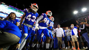 GAINESVILLE, FLORIDA - NOVEMBER 30: Head coach Dan Mullen and the Florida Gators take the field during a game against the Florida State Seminoles at Ben Hill Griffin Stadium on November 30, 2019 in Gainesville, Florida. (Photo by Mike Ehrmann/Getty Images)