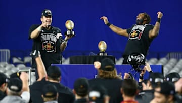 Jan 2, 2021; Glendale, AZ, USA; Iowa State Cyclones quarterback Brock Purdy (left) celebrates after receiving the offensive player of the game award with linebacker O'Rien Vance who received the defensive player of the game award after defeating the Oregon Ducks 34-17 at the 50th PlayStation Fiesta Bowl at State Farm Stadium. Mandatory Credit: Rob Schumacher-Arizona Republic via USA TODAY NetworkNcaa Football Oregon At Iowa State