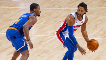 DETROIT, MI - DECEMBER 13: Derrick Rose #25 of the Detroit Pistons moves the ball up court in front of Dennis Smith Jr. #4 of the New York Knicks in the second half of an NBA game at Little Caesars Arena on December 13, 2020 in Detroit, Michigan. NOTE TO USER: User expressly acknowledges and agrees that, by downloading and or using this photograph, User is consenting to the terms and conditions of the Getty Images License Agreement. Detroit defeated New York 99-91. (Photo by Dave Reginek/Getty Images)