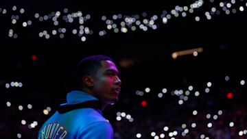 Theo Maledon #11 of the Oklahoma City Thunder stands on the court before the start of the NBA game against the Phoenix Suns at Footprint Center on December 23, 2021 in Phoenix, Arizona. (Photo by Christian Petersen/Getty Images)