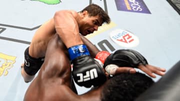 LAS VEGAS, NV - JULY 07: Paulo Costa of Brazil punches Uriah Hall of Jamaica in their middleweight fight during the UFC 226 event inside T-Mobile Arena on July 7, 2018 in Las Vegas, Nevada. (Photo by Josh Hedges/Zuffa LLC/Zuffa LLC via Getty Images)