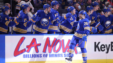 Dec 11, 2021; Buffalo, New York, USA; Buffalo Sabres left wing Vinnie Hinostroza (29) celebrates his goal with teammates during the first period against the Washington Capitals at KeyBank Center. Mandatory Credit: Timothy T. Ludwig-USA TODAY Sports