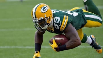 Aug 9, 2013; Green Bay, WI, USA; Green Bay Packers wide receiver James Jones (89) dives for extra yards after catching a pass during game against the Arizona Cardinals at Lambeau Field. Mandatory Credit: Benny Sieu-USA TODAY Sports