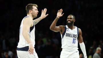 NEW YORK, NEW YORK - OCTOBER 27: Tim Hardaway Jr. #11 celebrates with Luka Doncic #77 of the Dallas Mavericks during overtime against the Brooklyn Nets at Barclays Center on October 27, 2022 in the Brooklyn borough of New York City. The Mavericks won 129-125. NOTE TO USER: User expressly acknowledges and agrees that, by downloading and or using this photograph, User is consenting to the terms and conditions of the Getty Images License Agreement. (Photo by Sarah Stier/Getty Images)