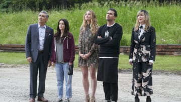 Schitt's Creek -- "Open Mic" -- Image Number: SCH406_0191.jpg -- Pictured (L-R): Daniel Levy as David Rose, Emily Hampshire as Stevie Budd, Annie Murphy as Alexis Rose, Daniel Levy as David Rose and Catherine OHara as Moira Rose -- Photo: 2020 Pop Media Group LLC.