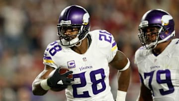 GLENDALE, AZ - DECEMBER 10: Running back Adrian Peterson