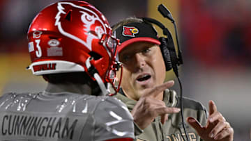 Nov 5, 2022; Louisville, Kentucky, USA; Louisville Cardinals head coach Scott Satterfield talks with quarterback Malik Cunningham (3) during the second half against the James Madison Dukes at Cardinal Stadium. Louisville defeated James Madison 34-10. Mandatory Credit: Jamie Rhodes-USA TODAY Sports
