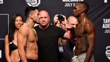 LAS VEGAS, NV - JULY 05: (L-R) Opponents Brad Tavares and Israel Adesanya of Nigeria face off during The Ultimate Fighter Finale weigh-in inside The Pearl concert theater at Palms Casino Resort on July 5, 2018 in Las Vegas, Nevada. (Photo by Jeff Bottari/Zuffa LLC/Zuffa LLC via Getty Images)