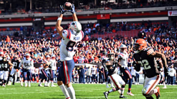 CLEVELAND, OHIO - OCTOBER 16: Hunter Henry #85 of the New England Patriots catches a pass while Grant Delpit #22 of the Cleveland Browns defends during the first half at FirstEnergy Stadium on October 16, 2022 in Cleveland, Ohio. (Photo by Jason Miller/Getty Images)